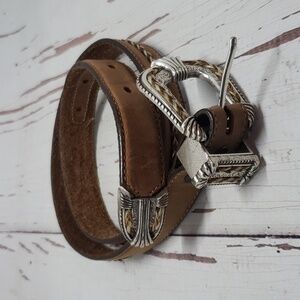 Tony Lama brown leather with breided real animal hair détails size 28